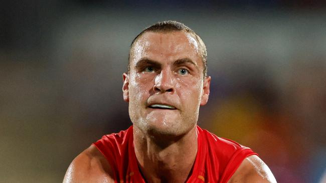 DARWIN, AUSTRALIA - MAY 11: Jarrod Witts of the Suns handpasses the ball during the 2024 AFL Round 09 match between the Gold Coast SUNS and North Melbourne Kangaroos at TIO Stadium on May 11, 2024 in Darwin, Australia. (Photo by Dylan Burns/AFL Photos via Getty Images)