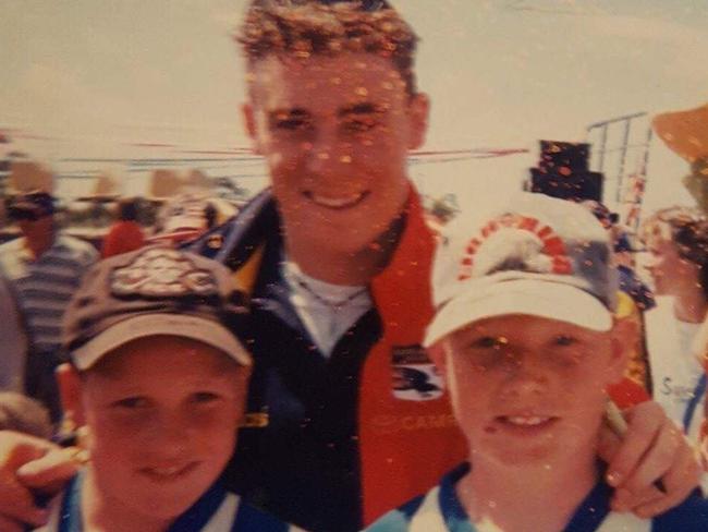 Crows ruckman Sam Jacobs (right) with brother Aaron in their junior playing days with Ardrossan, meeting Simon Goodwin on Adelaide's 1997 grand final tour on Yorke Peninsula.