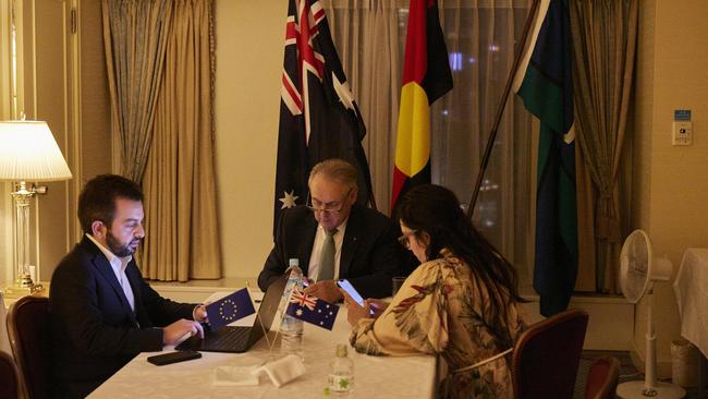 Trade Minister Don Farrell (centre) with senior media adviser Grace Finch (right) and chief-of-staff Ben Rillo (left) communicate with Prime Minister Anthony Albanese and Agriculture Minister Murray Watt and other stakeholders immediately following a one-on-one meeting between Senator Farrell and European Union Trade Commissioner Valdis Dombrovskis in Osaka, Japan, on October 30, 2023. Picture: Supplied