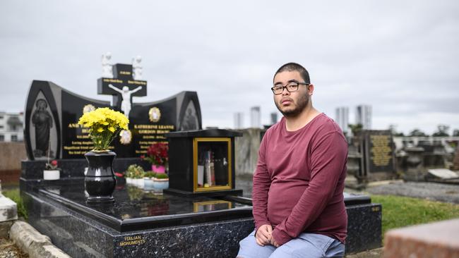 Bronko Hoang at gravesite of his sister and wife Katherine Hoang. Picture: Darren Leigh Roberts