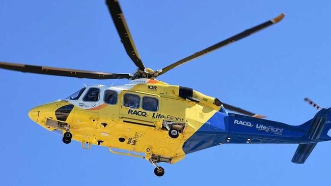 Two people have been freed from the wreckage of their car after being trapped following a serious crash involving two vehicles at a Bruce Highway intersection near Bundaberg.