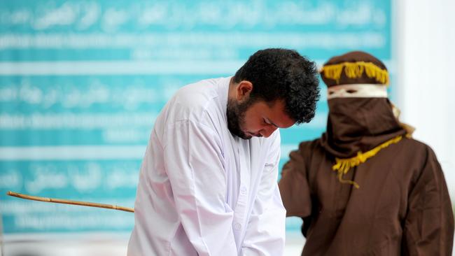 An Indonesian man being caned for gay sex under sharia law in Banda Aceh in May. (Pic: AFP/Chaideer Mahyuddin)