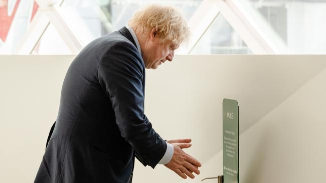 Boris Johnson visits a Marks &amp; Spencer in east London on Sunday. Picture: AFP