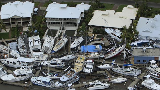 The aftermath of cyclone Yasi as it crossed the Far North Queensland coast. Dozens of luxury boats were smashed together at the Port Hinchinbrook marina in Cardwell.