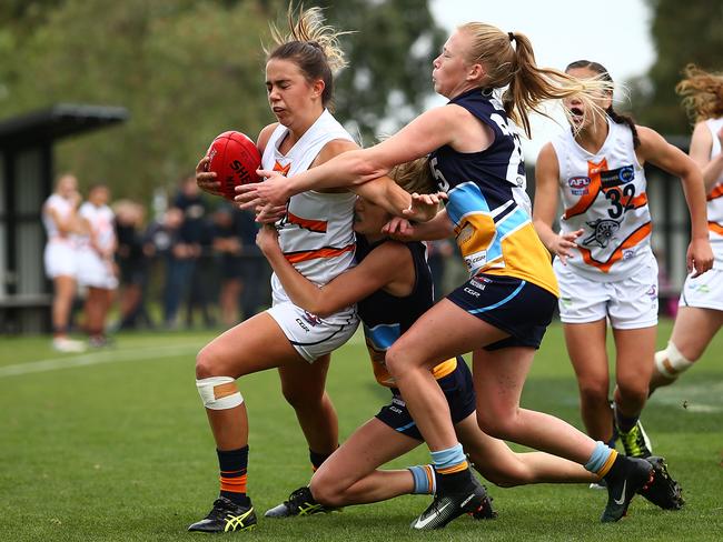 Chloe Molloy shrugs aside a Bendigo Pioneers opponent during the TAC Cup Girls season for Calder Cannons. Picture: Getty Images