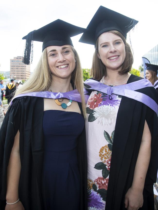 Sophie Sanderson and Nina Reid at UTAS graduations held at the Hobart Grand Chancellor. Picture: LUKE BOWDEN