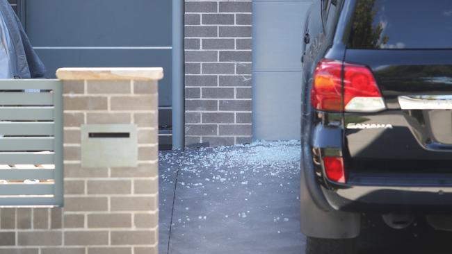 Ten people, including five children, were inside the Bankstown home when it was shot at on Sunday. Picture: Richard Dobson