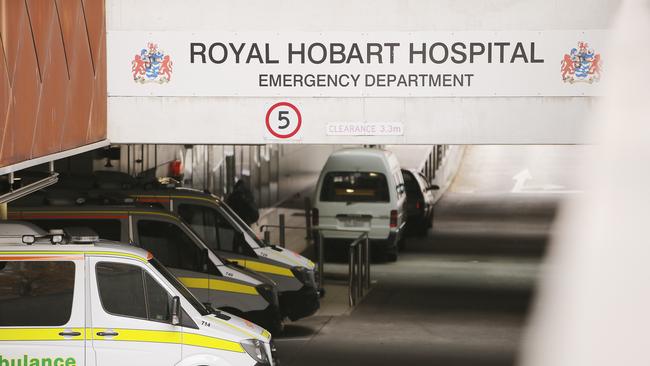 Ambulances parked outside the emergency ward at the Royal Hobart Hospital. Picture: MATHEW FARRELL