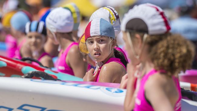 Competitors on the start line before their under-11 Female Board quarter-final event at the NSW Surf Life Saving Championships at Blacksmiths Beach on Friday, 28 February, 2020. Picture: Troy Snook