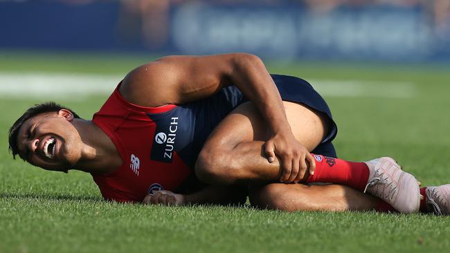 Melbourne's Jay Kennedy-Harris screams in pain after injuring his leg. Picture: Michael Klein