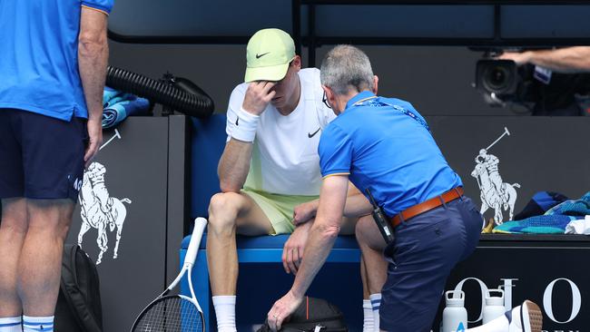 Italy's Jannik Sinner has a medical time-out while playing against Denmark's Holger Rune. Picture: Martin Keep / AFP