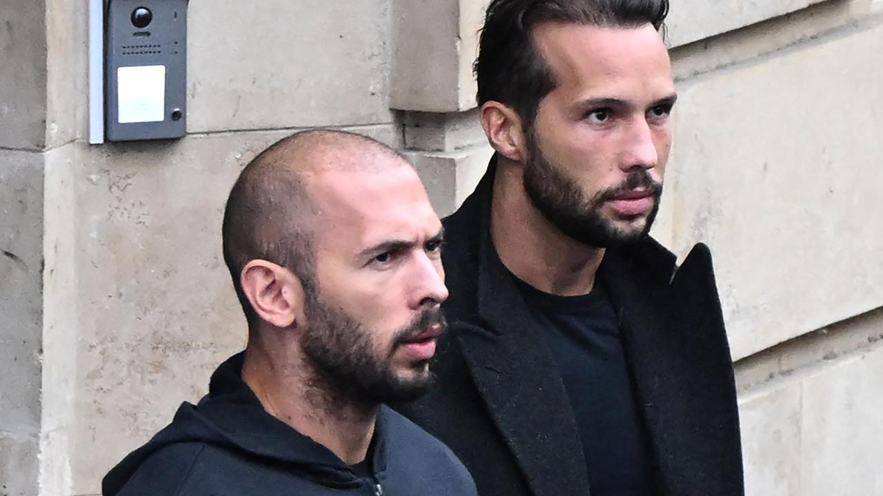 Andrew and Tristan Tate outside court in Romania, where they’re charged with various crimes. Picture: Daniel Mihailescu/AFP