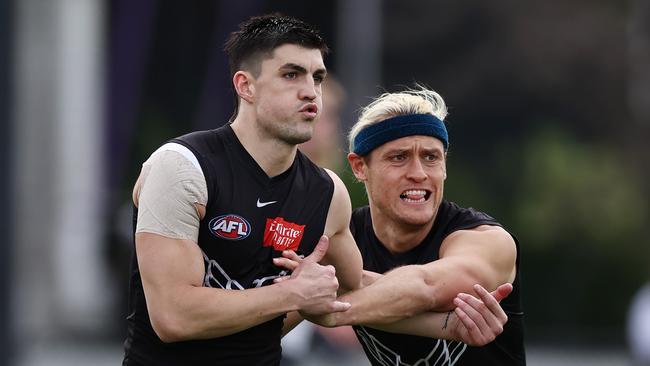 Brayden Maynard and Darcy Moore tangle during training. Picture: Michael Klein