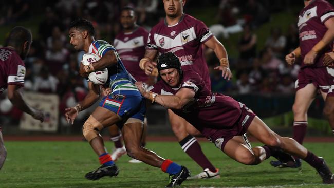 Yarrabah Seahawks' Hayden Golchert tries to stop Innisfail's Andrew Garret. Picture: Emily Barker