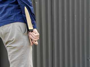 File shot of man with knife for court story.Photo: Rob Williams / The Queensland Times. Picture: Rob Williams