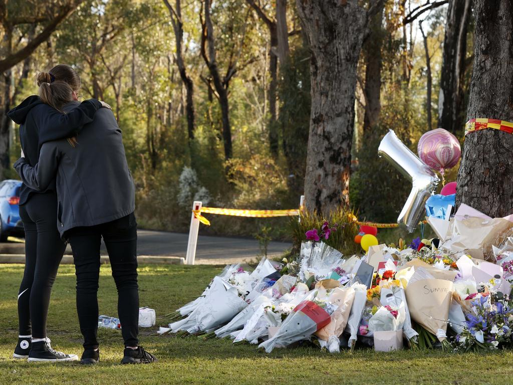 People at the crash site in Buxton where five friends from Picton High School died. Picture: Jonathan Ng