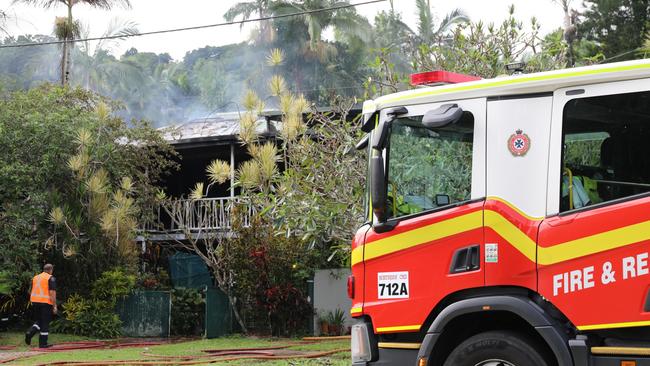 As flames spread across the two storey Queenslander three members of the public rescued the family inside. Station officer at Cairns Fire Station Dan Stowers confirmed everyone involved were safe and accounted for. Photo Tim Little.