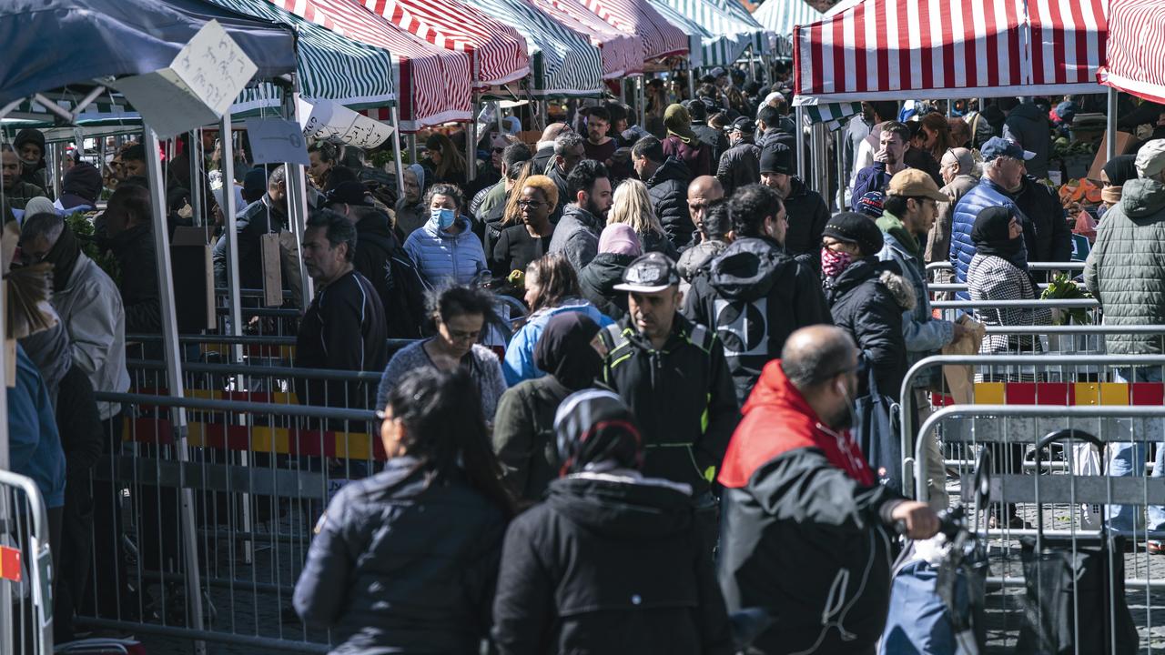 While some social-distancing measures have taken place, Swedes are still able to visit their local markets, such as the stalls at Mollevangstorget, in Malmo. Picture: Johan Nilsson/TT News Agency via AP