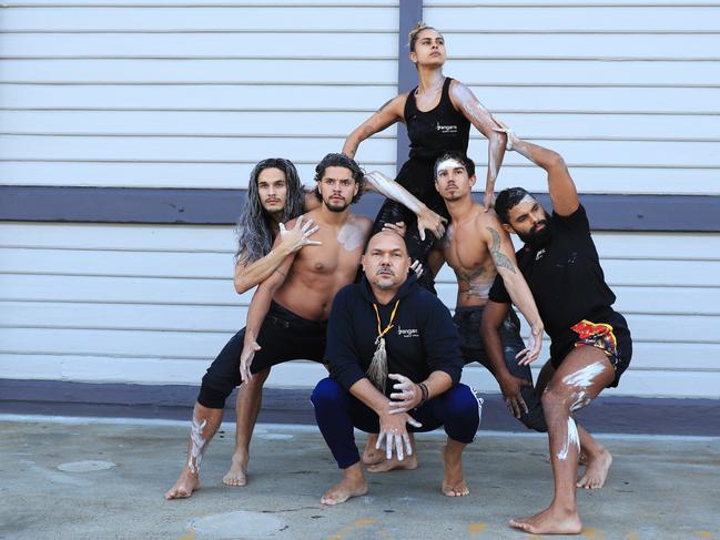 Bangarra dancers, Kiarn Doyle (left), Kallum Goolagong, Lillian Banks, Bradley Smith, Beau Dean and Riley Smith and Bangarra Artistic Director Stephen Page at Walsh Bay. Picture: John Feder