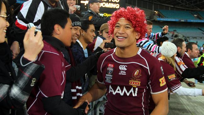 Israel Folau celebrates a Queensland State of Origin win in 2010.