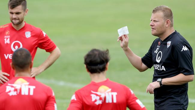 Adelaide United coach Josep Gombau addresses the team.