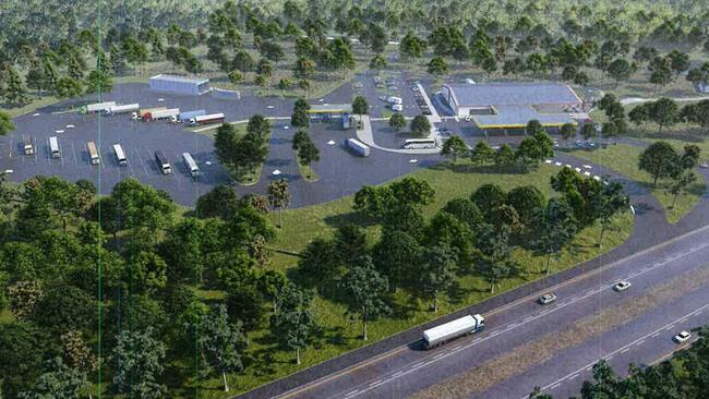 An aerial view shows the site of a proposed new service centre beside the Pacific Highway at New Italy.