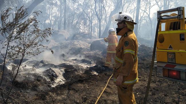 The Massie Rural Fire Service fighting fires in the Stanthorpe region on Saturday.