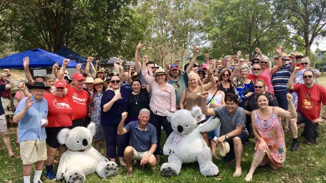 TSS PHOTO: Mt Gravatt East residents celebrate their development win.