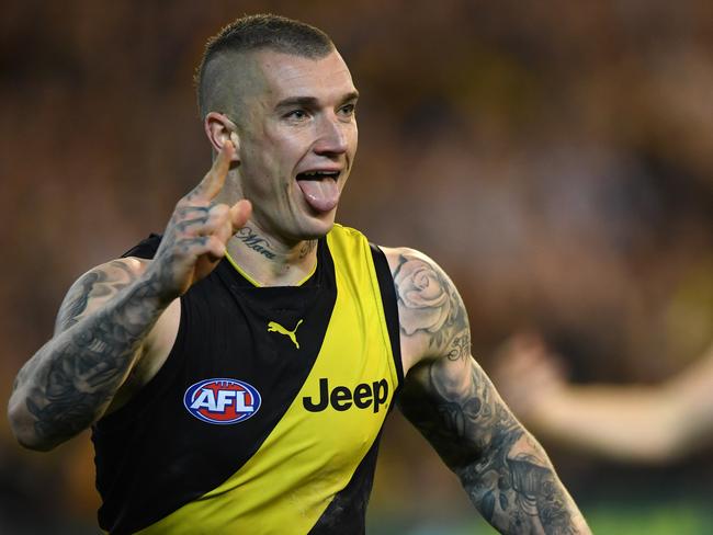 Dustin Martin of the Tigers reacts after kicking a goal during the second AFL preliminary final