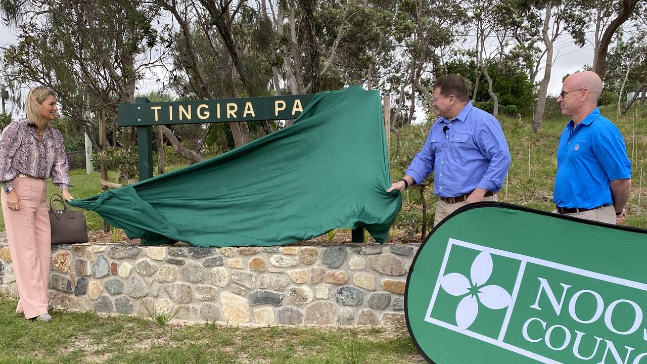 Mayor Clare Stewart, Federal Member for Wide Bay Llew O’Brien and Mark Goodwin of SGQ (right) unveil a new Tingira Park sign at the official opening of the new Orealla Bridge.