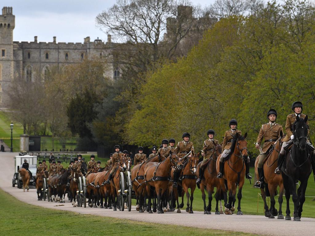 Members of the Household Cavalry Mounted Regiment ride their horses away from Windsor Castle in Windsor during the funeral rehearsal. Picture: Ben Stansall / AFP