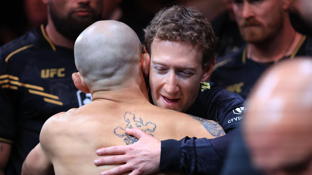 The pair embraced shortly before the fight started. (Photo by Sean M. Haffey / GETTY IMAGES NORTH AMERICA / Getty Images via AFP)