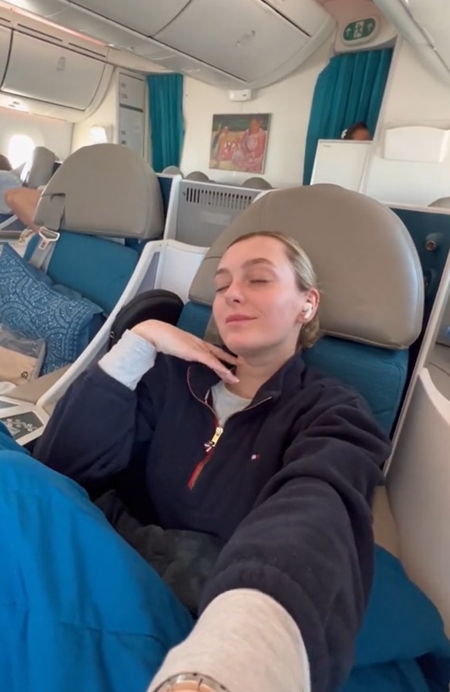 Ellis questioned whether she was a ‘horrible’ person for leaving them both in economy, adding it was her only opportunity to have a baby-free flight. Picture: TikTok/ellcochlin