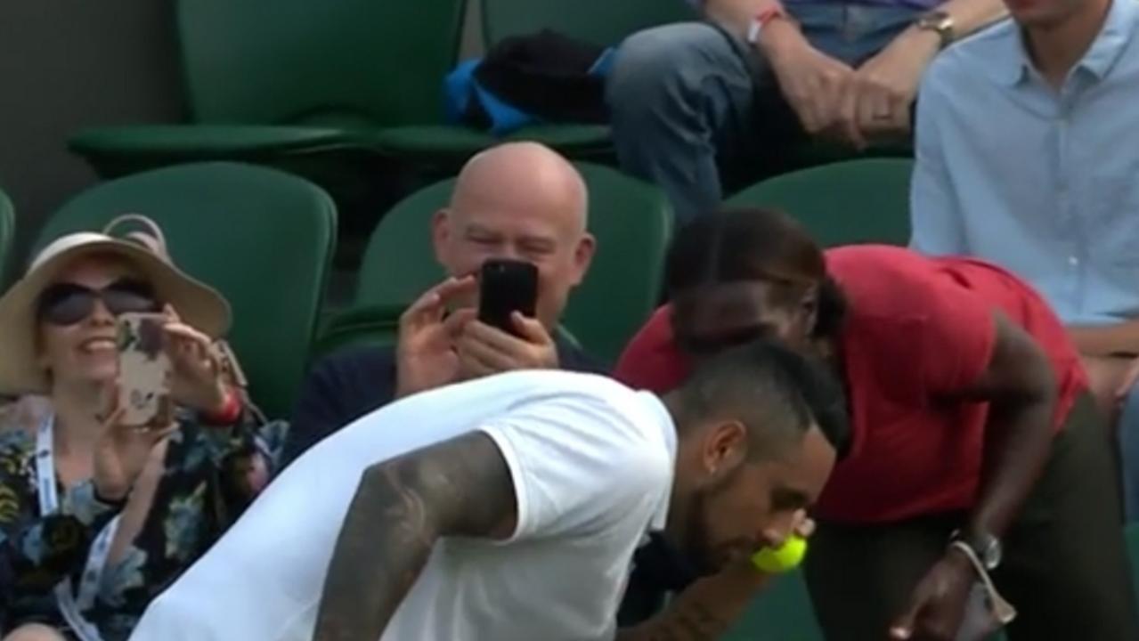 Nick Kyrgios gets some advice from a spectator.