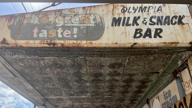 The once bustling milk bar now sits boarded up. Picture: Odessa Blain.