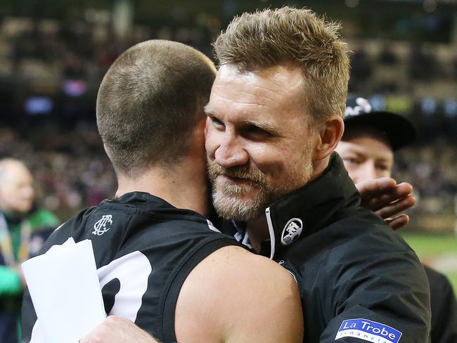 AFL 2nd Semi-Final. 15/09/2018. Collingwood vs GWS Giants at the MCG.  Collingwood coach Nathan Buckley hugs Steele Sidebottom   . Pic: Michael Klein