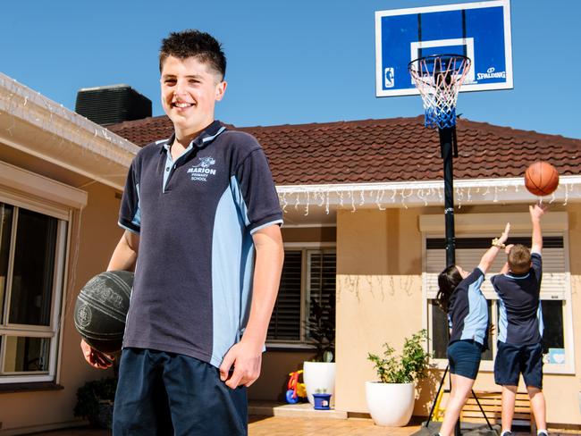 Levi, 12, Ellie and Bowen Hibberd, 10 in their sports uniforms. A state of education survey has found almost three quarters of parents and teachers believe kids should be able to wear 'sports-type' school uniforms every day In Adelaide, Thursday, December 2, 2021. (The Advertiser/ Morgan Sette)