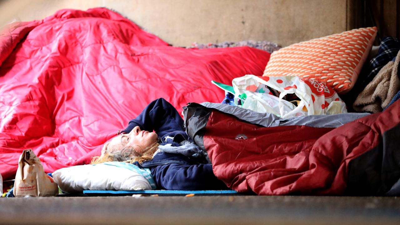 A homeless person outside Sydney’s Town Hall. Picture: NCA NewsWire/Damian Shaw