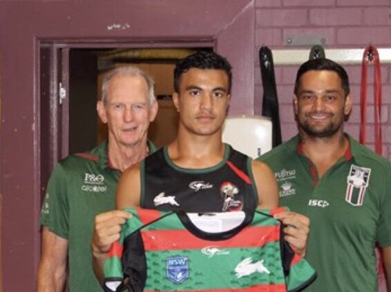 Joseph Suaalii with Wayne Bennett and John Sutton after signing with South Sydney