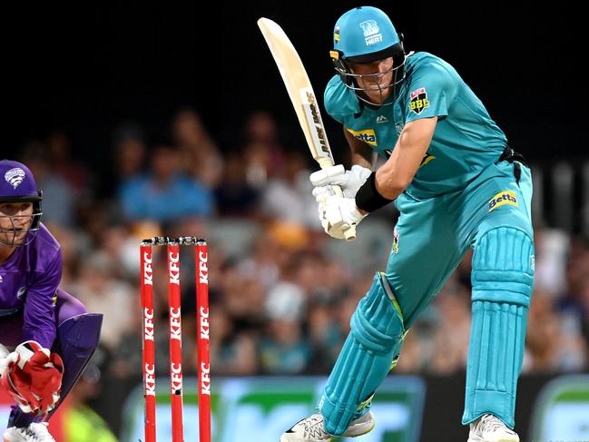 BRISBANE, AUSTRALIA - DECEMBER 27: James Bazley of the Heat plays a shot during the Big Bash League match between the Brisbane Heat and the Hobart Hurricanes at The Gabba, on December 27, 2020, in Brisbane, Australia. (Photo by Bradley Kanaris/Getty Images)