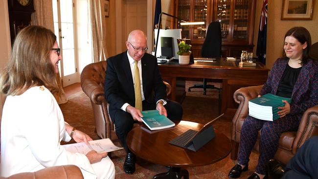 Governor General David Hurley recieves the final report of The Royal Commission into Aged Care Quality and Safety from Commisioner Lynelle Briggs (left) and Acting Official Secretary Sara Samios. Pcture: AAP Image/Dan Himbrechts