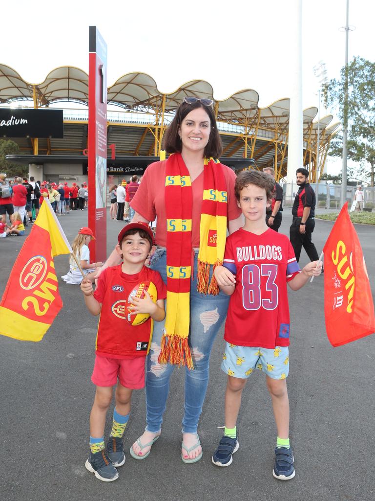 The Gold Coast Suns will host its first AFLW final when they take on the Sydney Swans on Saturday night. Archie, Meg and Oliver Donovan. 11 November 2023 Carrara Picture by Richard Gosling