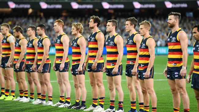 The Crows line up for the national anthem before the preliminary final against Geelong. Picture: AAP Image/Tracey Nearmy