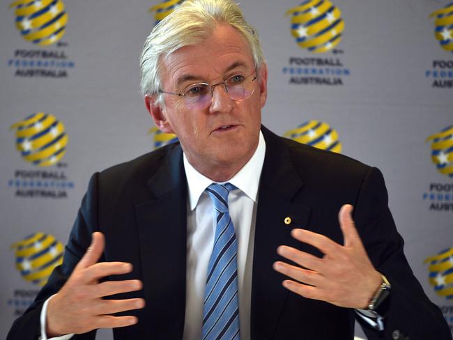 Football Federation Australia chairman Steven Lowy speaks at a press conference at the federation's head office in Sydney on November 30, 2017. / AFP PHOTO / PETER PARKS / --IMAGE RESTRICTED TO EDITORIAL USE - STRICTLY NO COMMERCIAL USE--