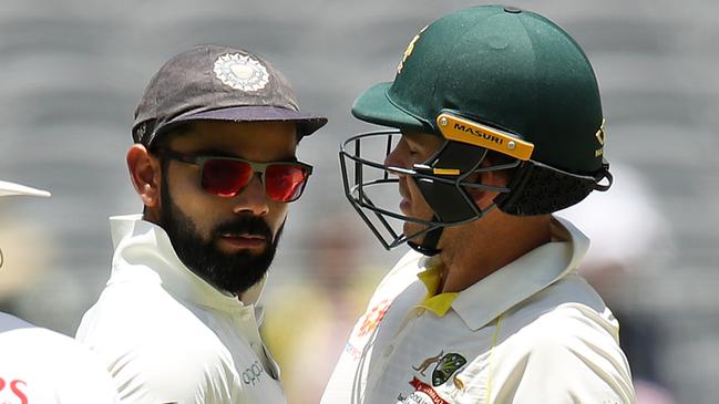 Virat Kohli and Tim Paine getting up close with each other in Perth. (Photo by Cameron Spencer/Getty Images)