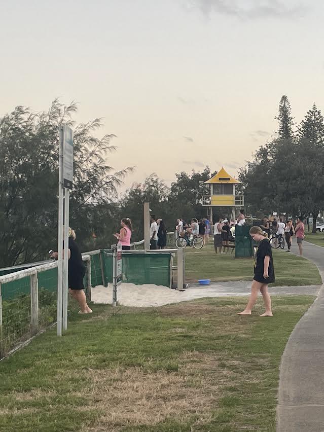 People watching on as police search for the missing man off Miami Beach on Thursday. Picture: Kaitlyn Smith/Gold Coast Bulletin