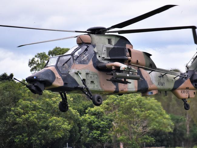An Australian Army Tiger Armed Reconnaissance Helicopter from the 1st Aviation Regiment based in Darwin. Photographs from Exercise Vigilant Scimitar 2022, the 16th Aviation Brigade Foundation War Fighting activity featuring attack helicopters at the Ingham Aerodrome on Sunday. Photograph: Cameron Bates