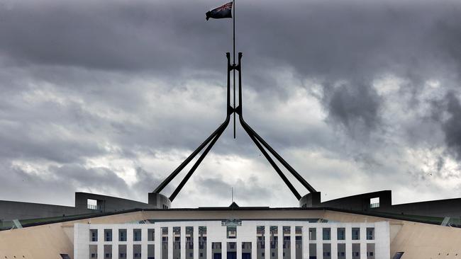 CANBERRA, AUSTRALIA NewsWire Photos - SEPTEMBER 20, 2021: COVID-19 and bad weather has kept most Canberrans inside as the ACT records 7 new cases. Storm clouds gather over Parliament House in Canberra.Picture: Newswire/Gary Ramage