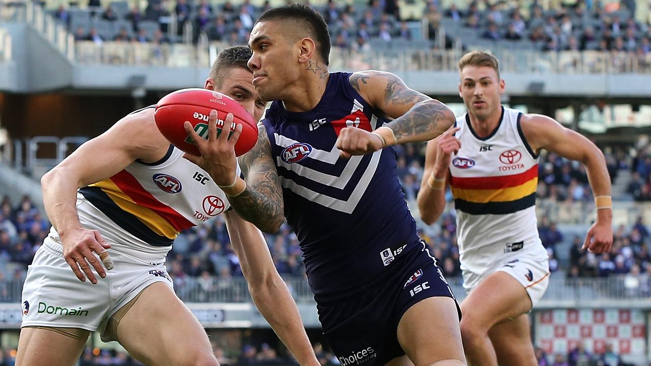 Fremantle forward Michael Walters reported for headbutting Tom Doedee