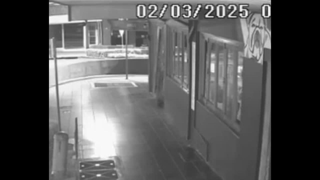 VIDEO: Moment man breaks into popular cafe